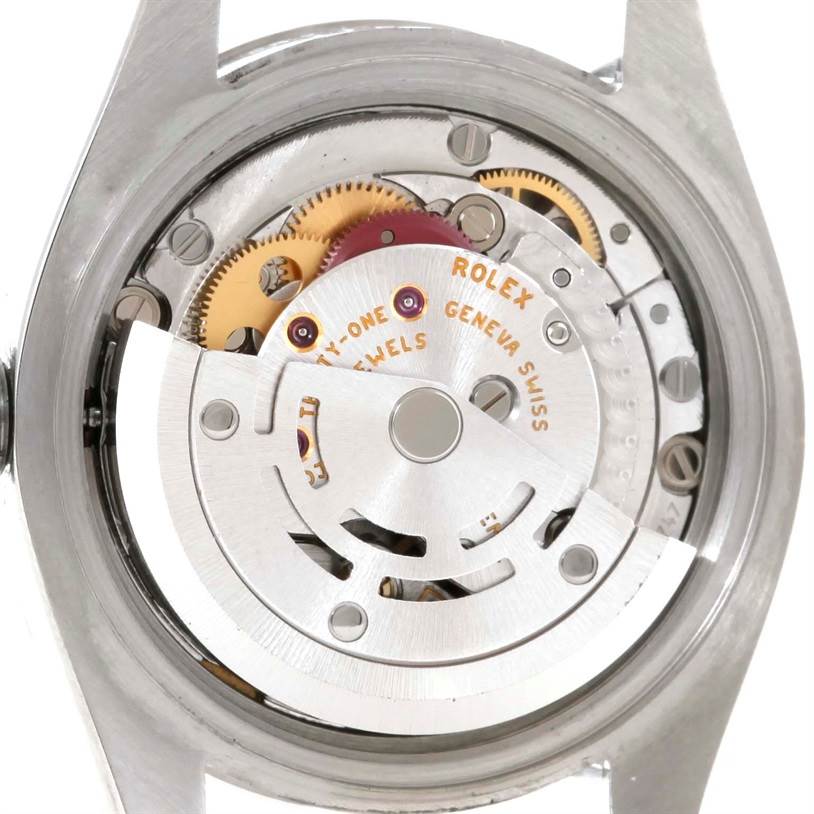 This is a close-up view of the movement mechanism of the Rolex Oyster Perpetual 176234 Women's Stainless Steel White Dial 176234 Women's Stainless Steel White Dial watch.