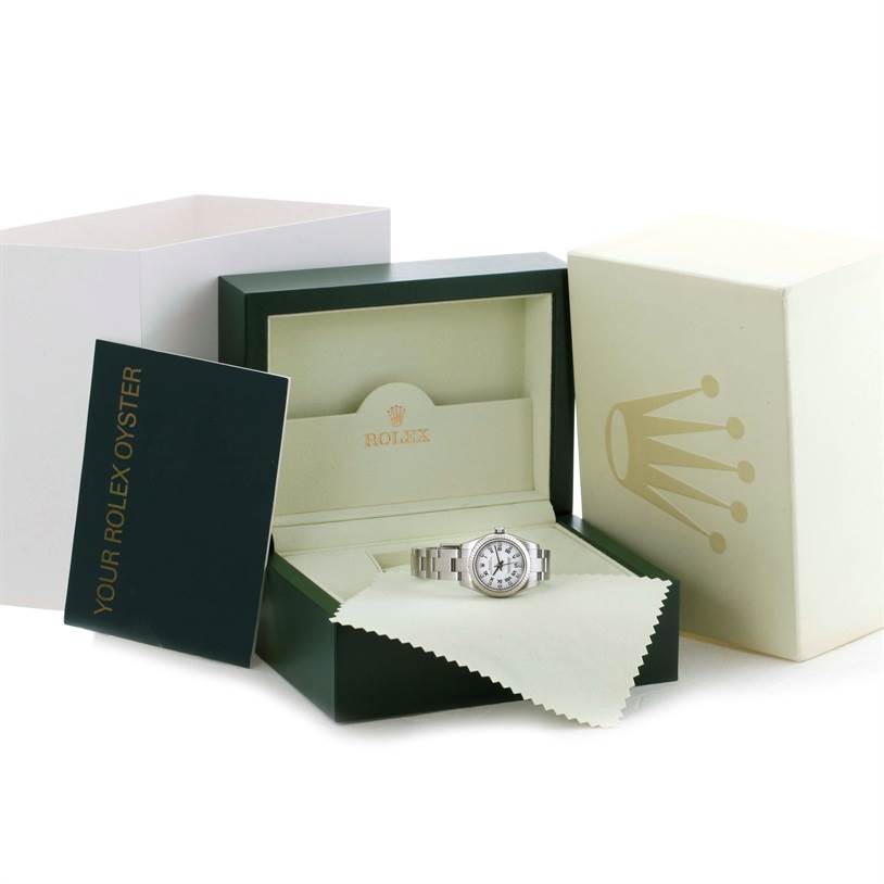 The image shows a Rolex Oyster Perpetual 176234 Women's Stainless Steel White Dial 176234 Women's Stainless Steel White Dial watch in its original open box, with accompanying packaging and manual.