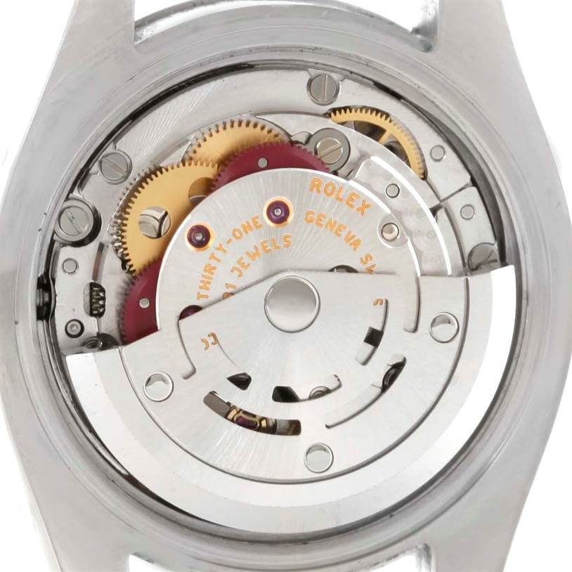 This image shows the movement and internal mechanism of a Rolex Oyster Perpetual 176200 Women's Stainless Steel Black Dial 176200 Women's Stainless Steel Black Dial watch from a back angle.