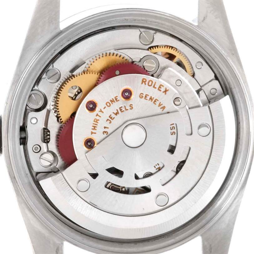 The image shows the internal movement mechanism of the Rolex Oyster Perpetual 76080 Women's Stainless Steel Pink Dial 76080 Women's Stainless Steel Pink Dial watch from a back view angle.