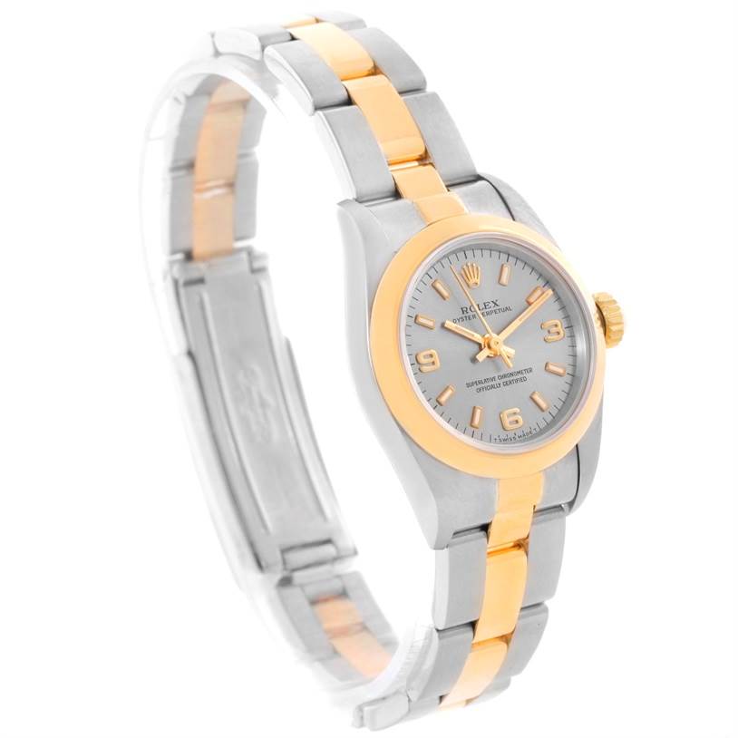 The image shows a side and front angled view of the Rolex Oyster Perpetual 67183 Women's Steel and Gold (two tone) Grey Dial 67183 Women's Steel and Gold (two tone) Grey Dial watch, highlighting its two-tone bracelet and face.