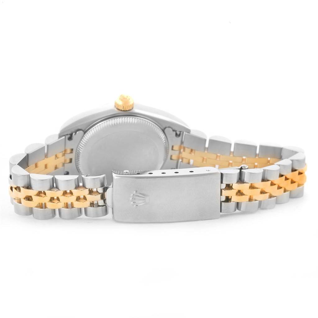 The image shows the back view of a Rolex Oyster Perpetual 76183 Women's Steel and Gold (two tone) Grey Dial 76183 Women's Steel and Gold (two tone) Grey Dial watch, highlighting its clasp, bracelet, and case back.