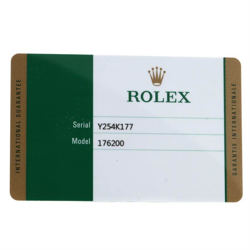 The image shows an international guarantee card for a Rolex Oyster Perpetual 176200 Women's Stainless Steel Black Dial 176200 Women's Stainless Steel Black Dial model 176200 watch, with serial number Y254K177.