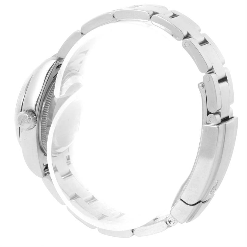 This image shows a side view of the Rolex Oyster Perpetual 176200 Women's Stainless Steel White Dial 176200 Women's Stainless Steel White Dial watch, highlighting the crown, case, and part of the bracelet.