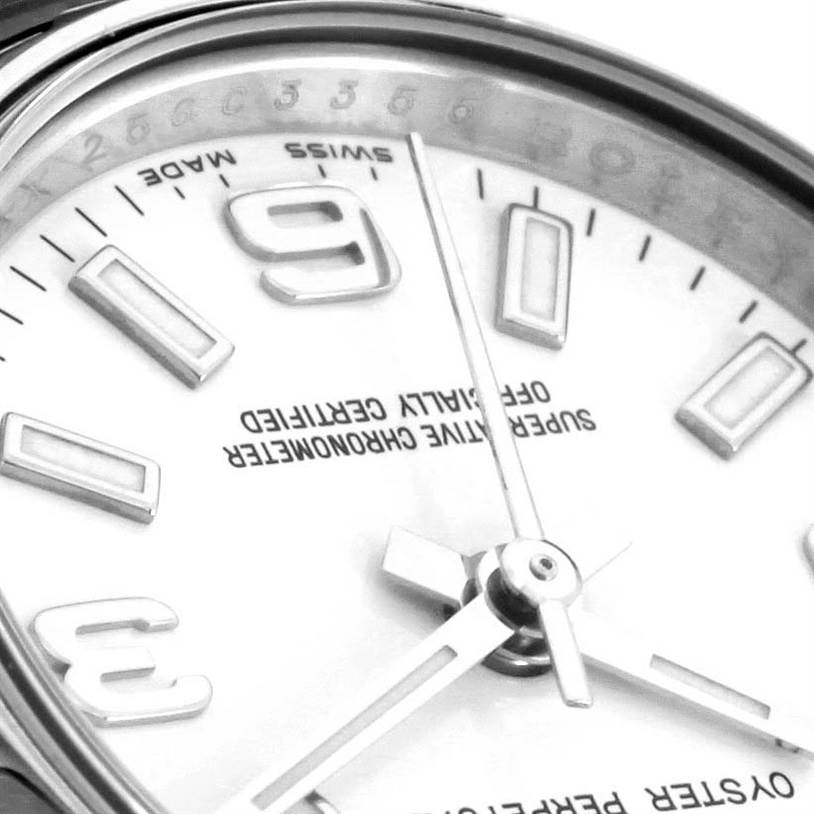 This close-up shows the dial, hands, and part of the bezel of a Rolex Oyster Perpetual 176200 Women's Stainless Steel White Dial 176200 Women's Stainless Steel White Dial watch.