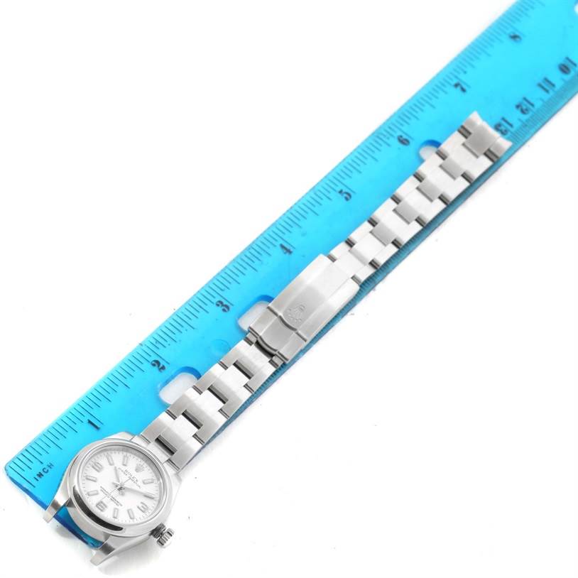 The Rolex Oyster Perpetual 176200 Women's Stainless Steel White Dial 176200 Women's Stainless Steel White Dial watch is shown from an overhead angle with both the dial and bracelet fully visible.