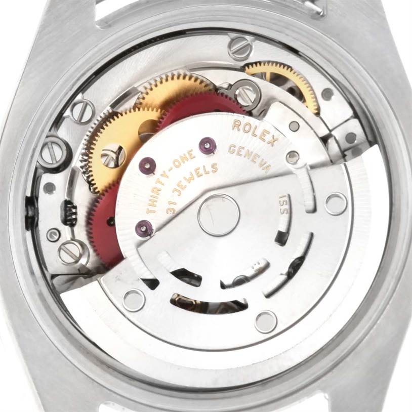 This image shows the intricate movement mechanism of a Rolex Oyster Perpetual 176200 Women's Stainless Steel Black Dial 176200 Women's Stainless Steel Black Dial watch from the back.