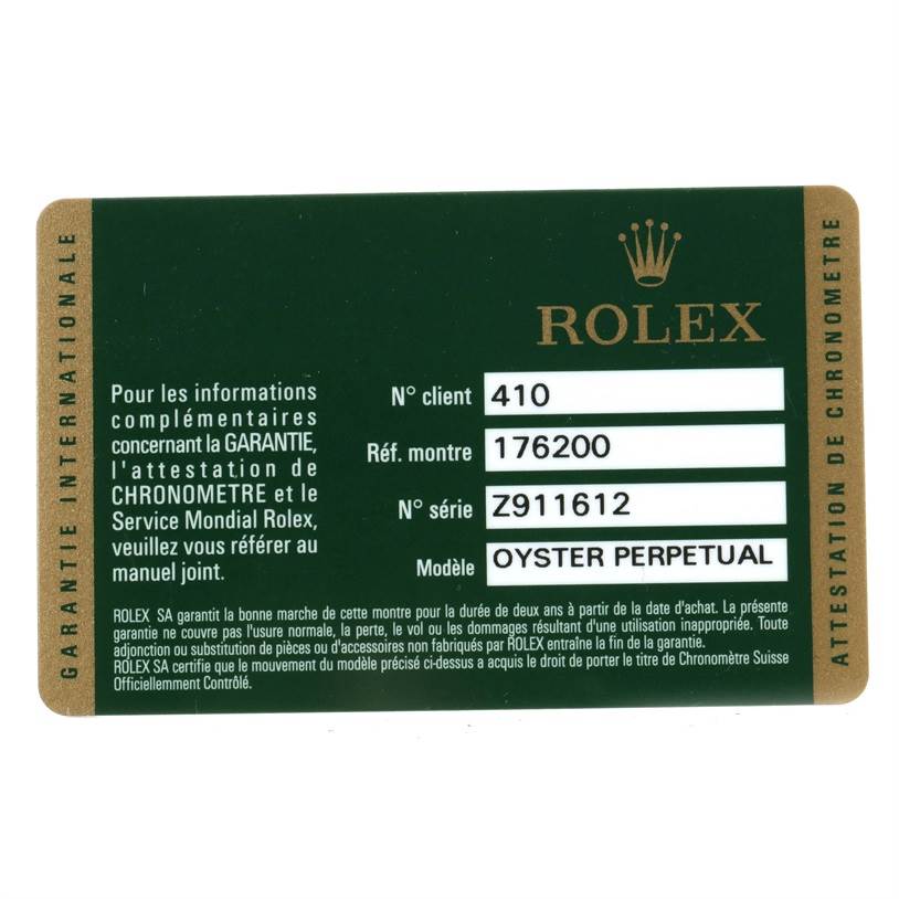 This image shows the warranty card for a Rolex Oyster Perpetual 176200 Women's Stainless Steel Pink Dial 176200 Women's Stainless Steel Pink Dial watch, displaying model and serial numbers.