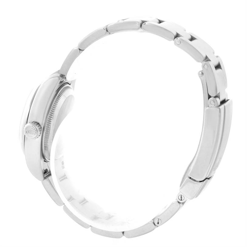 The image shows a side profile view of a Rolex Oyster Perpetual 176200 Women's Stainless Steel Pink Dial 176200 Women's Stainless Steel Pink Dial watch, highlighting the bracelet links and crown.