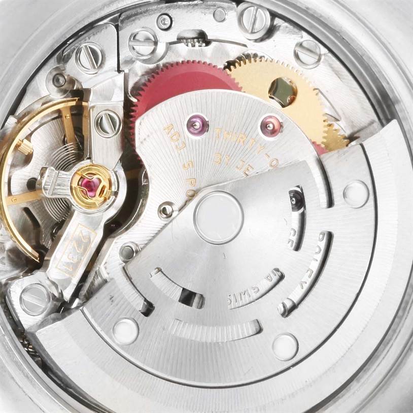 The image shows the internal mechanical movement and components of a Rolex Oyster Perpetual 176200 Women's Stainless Steel Blue Dial 176200 Women's Stainless Steel Blue Dial watch from a close-up, top-down angle.