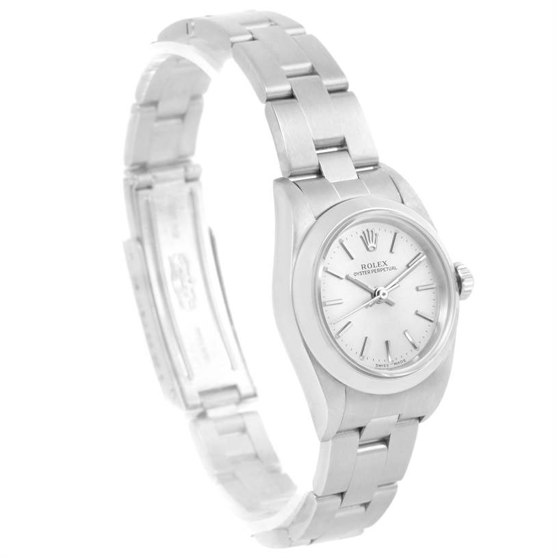 This Rolex Oyster Perpetual 76080 Women
s Stainless Steel Silver Dial 76080 Women
s Stainless Steel Silver Dial watch is shown at a slight angle, displaying the face, bezel, crown, and bracelet.