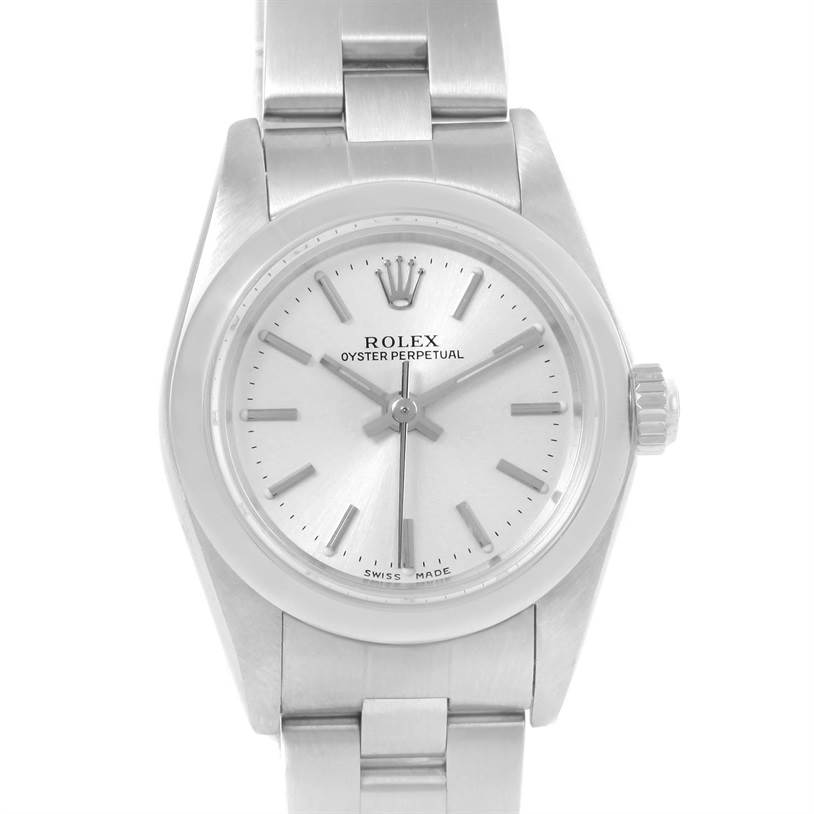 The image shows a front view of a Rolex Oyster Perpetual 76080 Women
s Stainless Steel Silver Dial 76080 Women
s Stainless Steel Silver Dial watch, detailing the dial, crown, and stainless steel bracelet.
