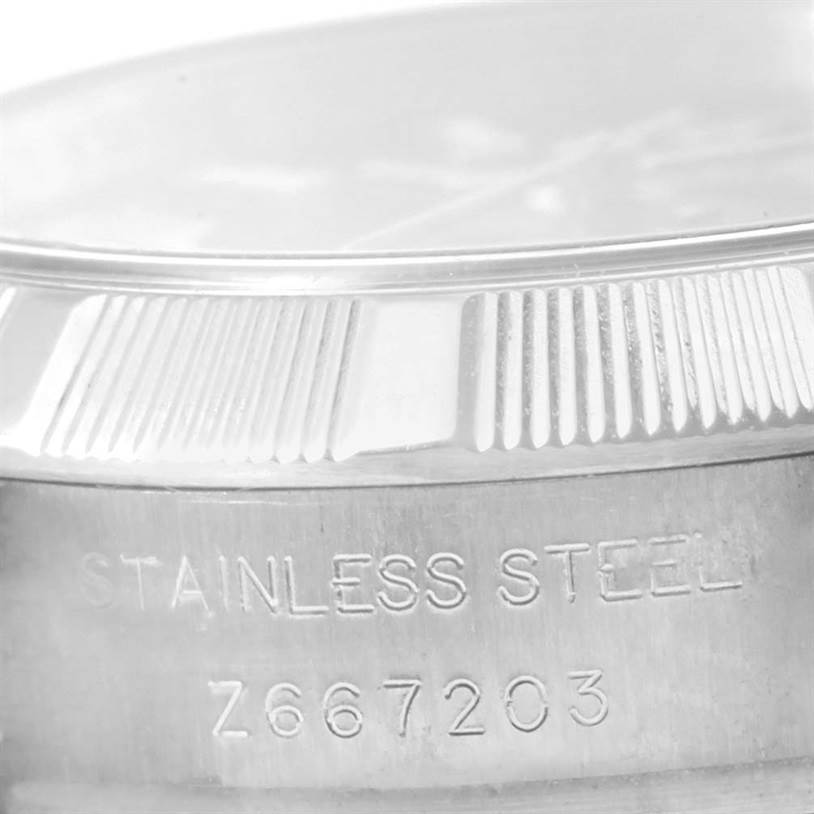 This image shows a close-up of the case side and bezel of a Rolex Oyster Perpetual 176210 Women's Stainless Steel Black Dial 176210 Women's Stainless Steel Black Dial watch, highlighting the stainless steel material and model number.