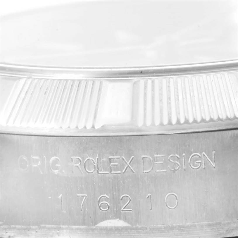 The image shows a close-up of the bezel and case side of a Rolex Oyster Perpetual 176210 Women's Stainless Steel Black Dial 176210 Women's Stainless Steel Black Dial watch, with "ORIG. ROLEX DESIGN" engraved.