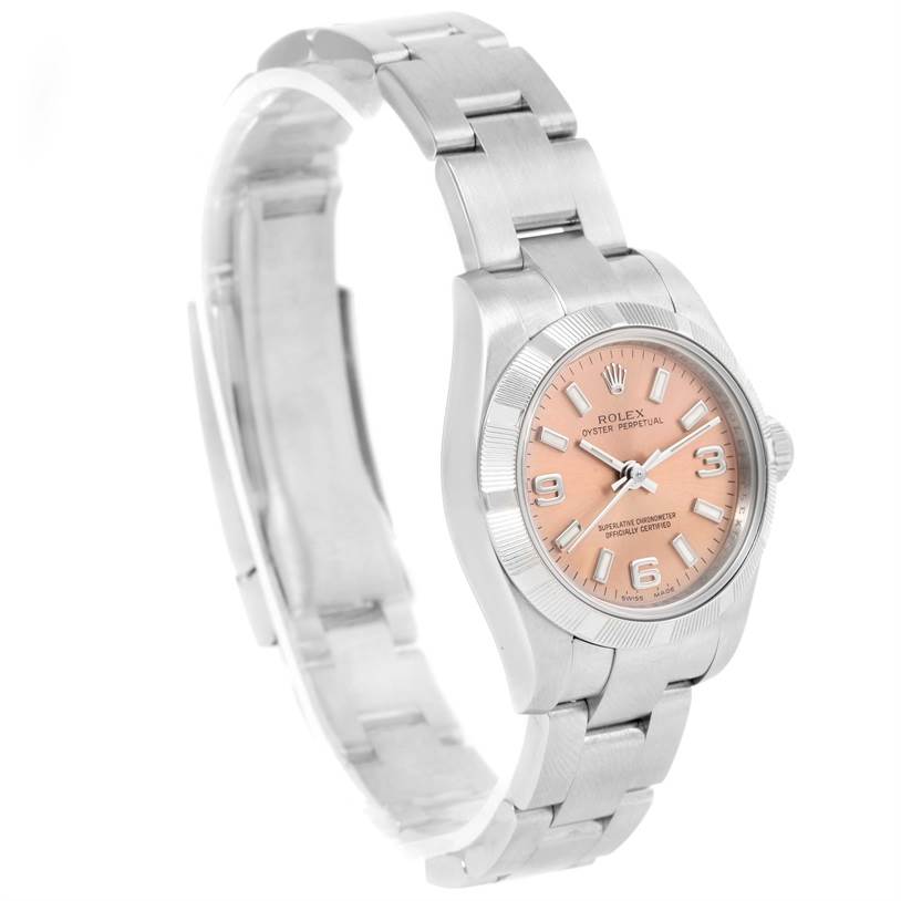 This image shows a side angle view of a Rolex Oyster Perpetual 176200 Women's Stainless Steel Pink Dial 176200 Women's Stainless Steel Pink Dial watch with its band, dial, and bezel visible.