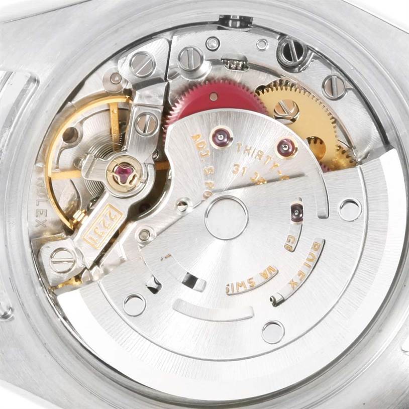 This image shows a close-up view of the movement inside a Rolex Oyster Perpetual 176200 Women's Stainless Steel Pink Dial 176200 Women's Stainless Steel Pink Dial watch.