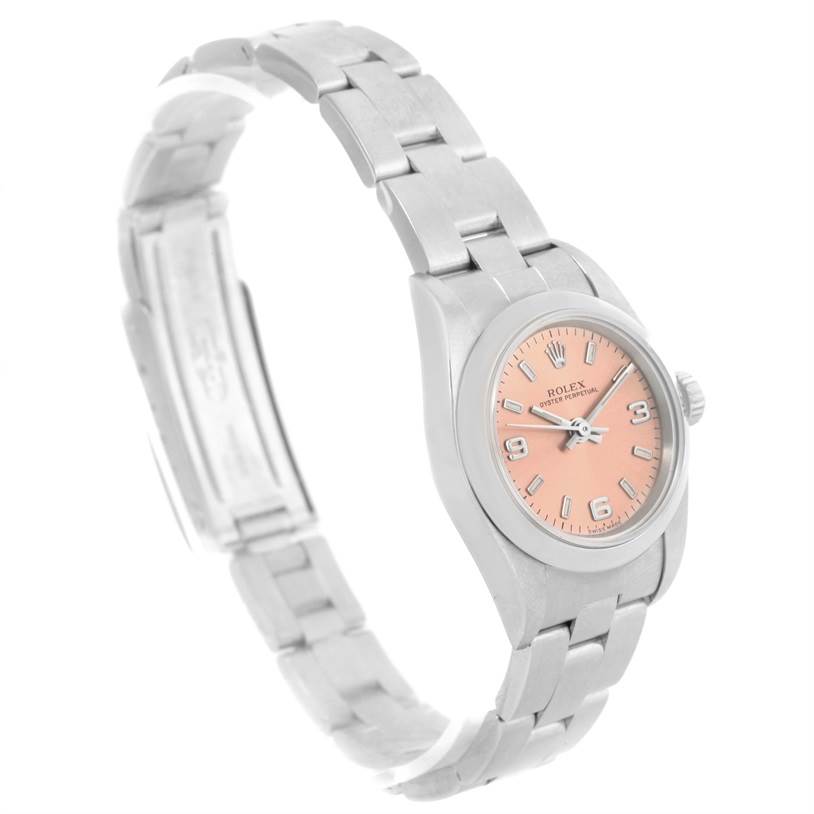 The image shows a side angle view of a Rolex Oyster Perpetual 76080 Women's Stainless Steel Pink Dial 76080 Women's Stainless Steel Pink Dial watch, highlighting the band, case, and dial.