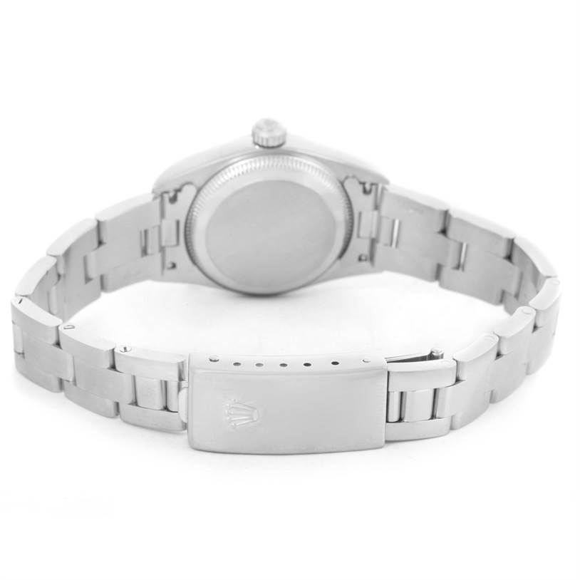 This image shows the back view of the Rolex Oyster Perpetual 76080 Women's Stainless Steel Pink Dial 76080 Women's Stainless Steel Pink Dial watch, highlighting the case back and the clasp of the bracelet.