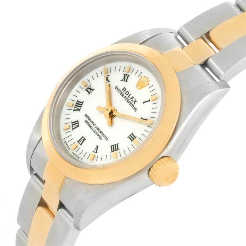 The image shows a close-up angle of a Rolex Oyster Perpetual 76183 Women's Steel and Gold (two tone) White Dial 76183 Women's Steel and Gold (two tone) White Dial watch featuring the dial, bezel, and part of the bracelet.