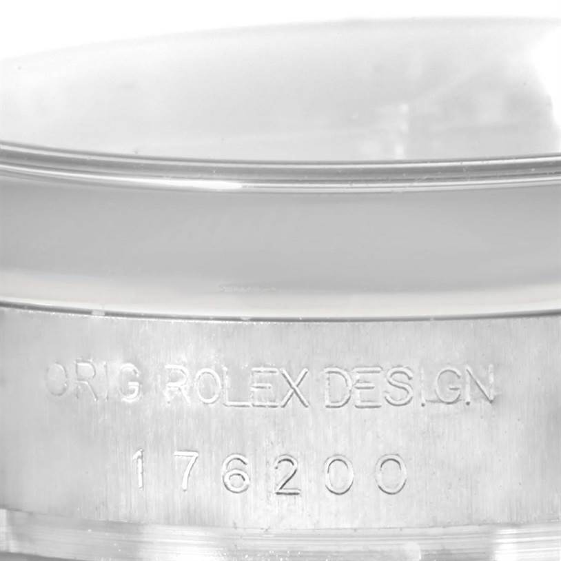 The image shows a close-up of the engraved case back of a Rolex Oyster Perpetual 176200 Women's Stainless Steel Blue Dial 176200 Women's Stainless Steel Blue Dial watch, displaying the model number 176200.