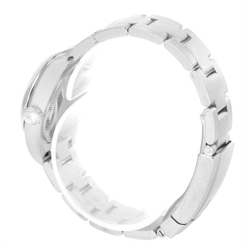 The image shows a side view of a Rolex Oyster Perpetual 176200 Women's Stainless Steel Blue Dial 176200 Women's Stainless Steel Blue Dial watch, highlighting its metal band and side profile.