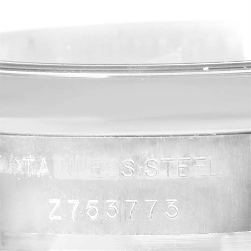 This image shows a close-up of the casing with engraving on a Rolex Oyster Perpetual 176200 Women's Stainless Steel Blue Dial 176200 Women's Stainless Steel Blue Dial watch.