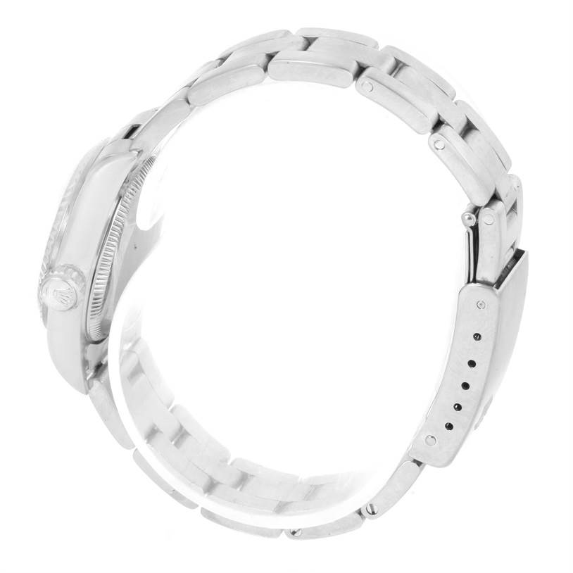 This side view of the Rolex Oyster Perpetual 67194 Women's Stainless Steel Silver Dial 67194 Women's Stainless Steel Silver Dial watch showcases its bracelet, clasp, and side profile, including the crown.