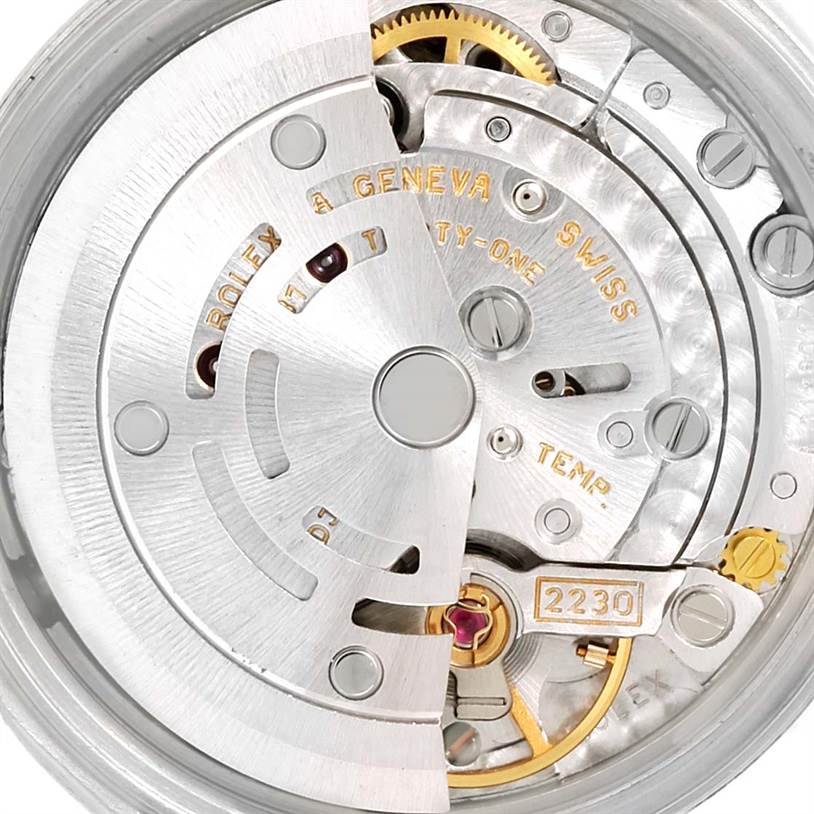This image shows a close-up, internal view of the Rolex Oyster Perpetual 76080 Women's Stainless Steel Black Dial 76080 Women's Stainless Steel Black Dial watch movement and mechanism components.