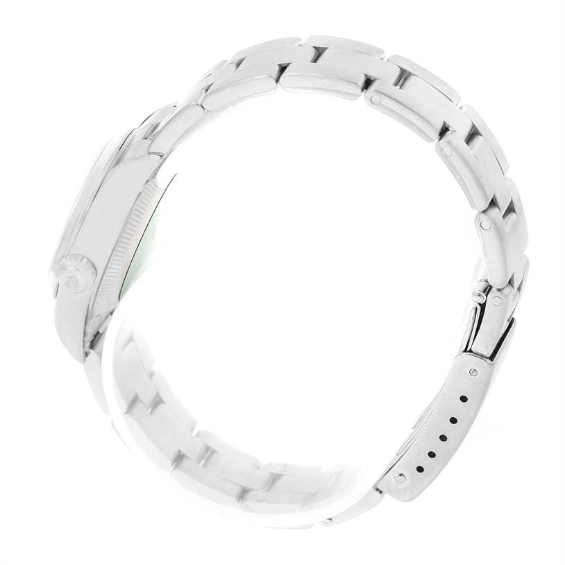 The image shows a side view of a Rolex Oyster Perpetual 76080 Women's Stainless Steel Black Dial 76080 Women's Stainless Steel Black Dial watch, focusing on the bracelet and the side of the case.