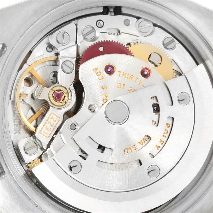 This image shows the inner movement and mechanism of a Rolex Oyster Perpetual 176200 Women's Stainless Steel Pink Dial 176200 Women's Stainless Steel Pink Dial watch from a close-up angle.