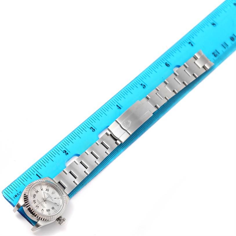 The image shows a horizontal view of a Rolex Oyster Perpetual 176234 Women's Stainless Steel Grey Dial 176234 Women's Stainless Steel Grey Dial watch, focusing on the face and entire bracelet laid beside a ruler.