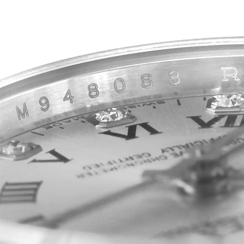 The image shows a close-up of the serial number and dial of a Rolex Oyster Perpetual 176234 Women's Stainless Steel Grey Dial 176234 Women's Stainless Steel Grey Dial watch, highlighting the Roman numeral markers and diamond accents.