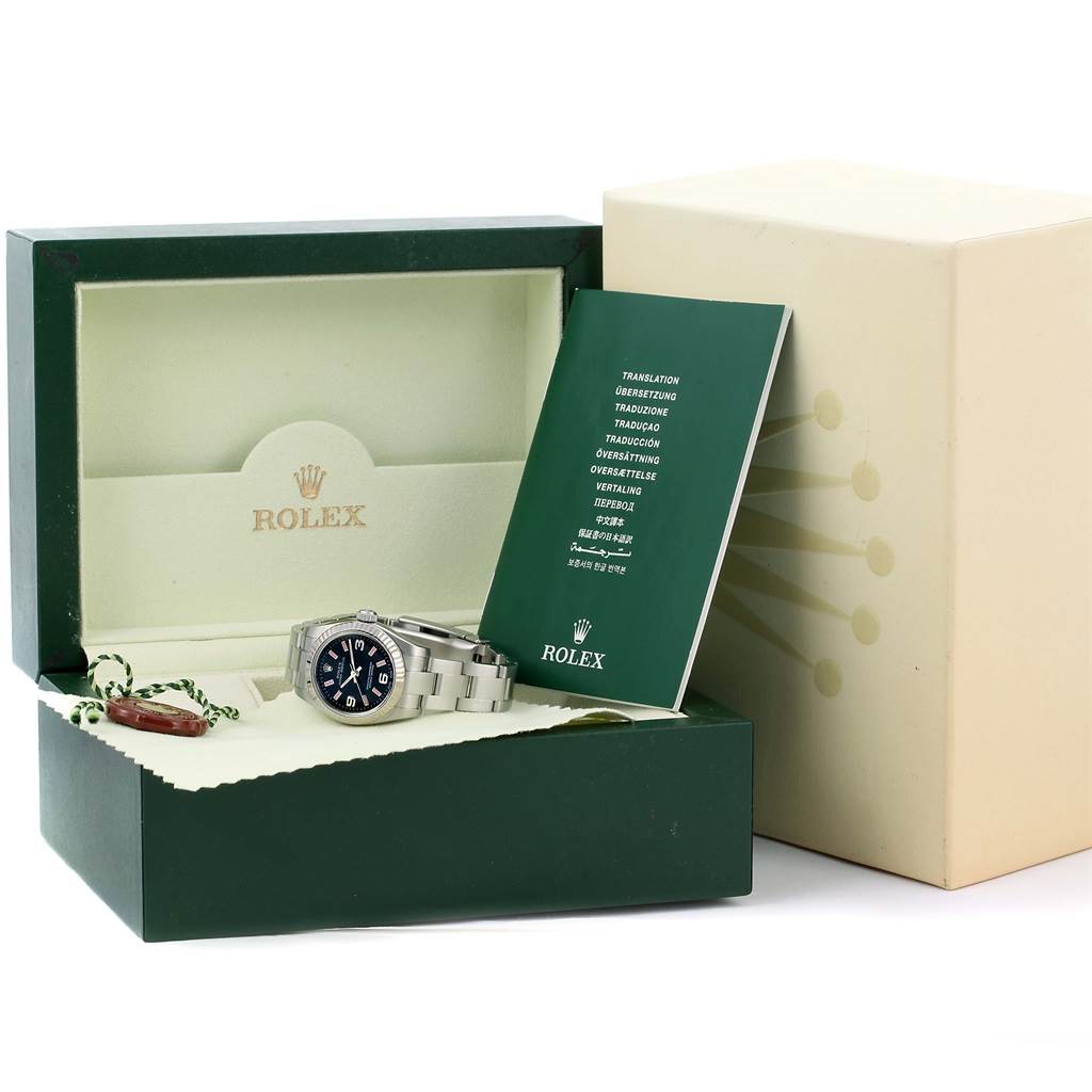 The image shows a Rolex Oyster Perpetual 176234 Women
s Stainless Steel Black Dial 176234 Women
s Stainless Steel Black Dial watch with its box, booklet, and tag.