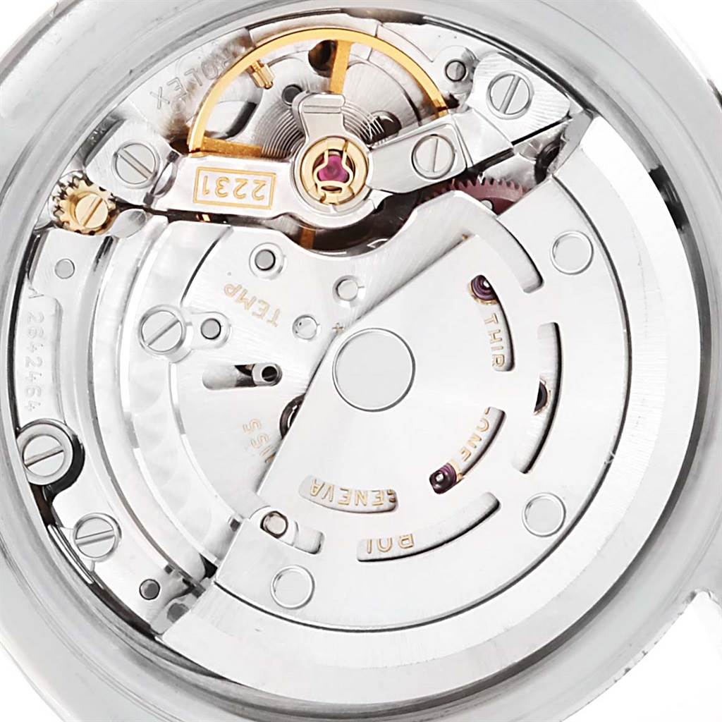 This image shows a close-up view of the movement mechanism of the Rolex Oyster Perpetual 176234 Women
s Stainless Steel Black Dial 176234 Women
s Stainless Steel Black Dial watch.