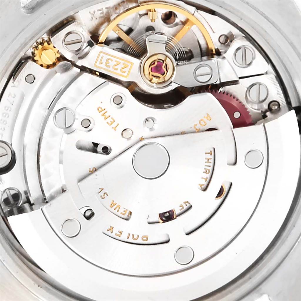 This image shows the detailed internal mechanism of the Rolex Oyster Perpetual 176200 Women's Stainless Steel Pink Dial 176200 Women's Stainless Steel Pink Dial watch at a close-up angle.