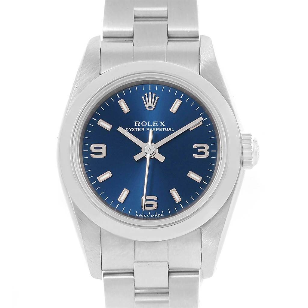 This image shows a Rolex Oyster Perpetual 76080 Women
s Stainless Steel Blue Dial 76080 Women
s Stainless Steel Blue Dial watch from a front angle, highlighting its blue dial, silver markers, and metal bracelet.