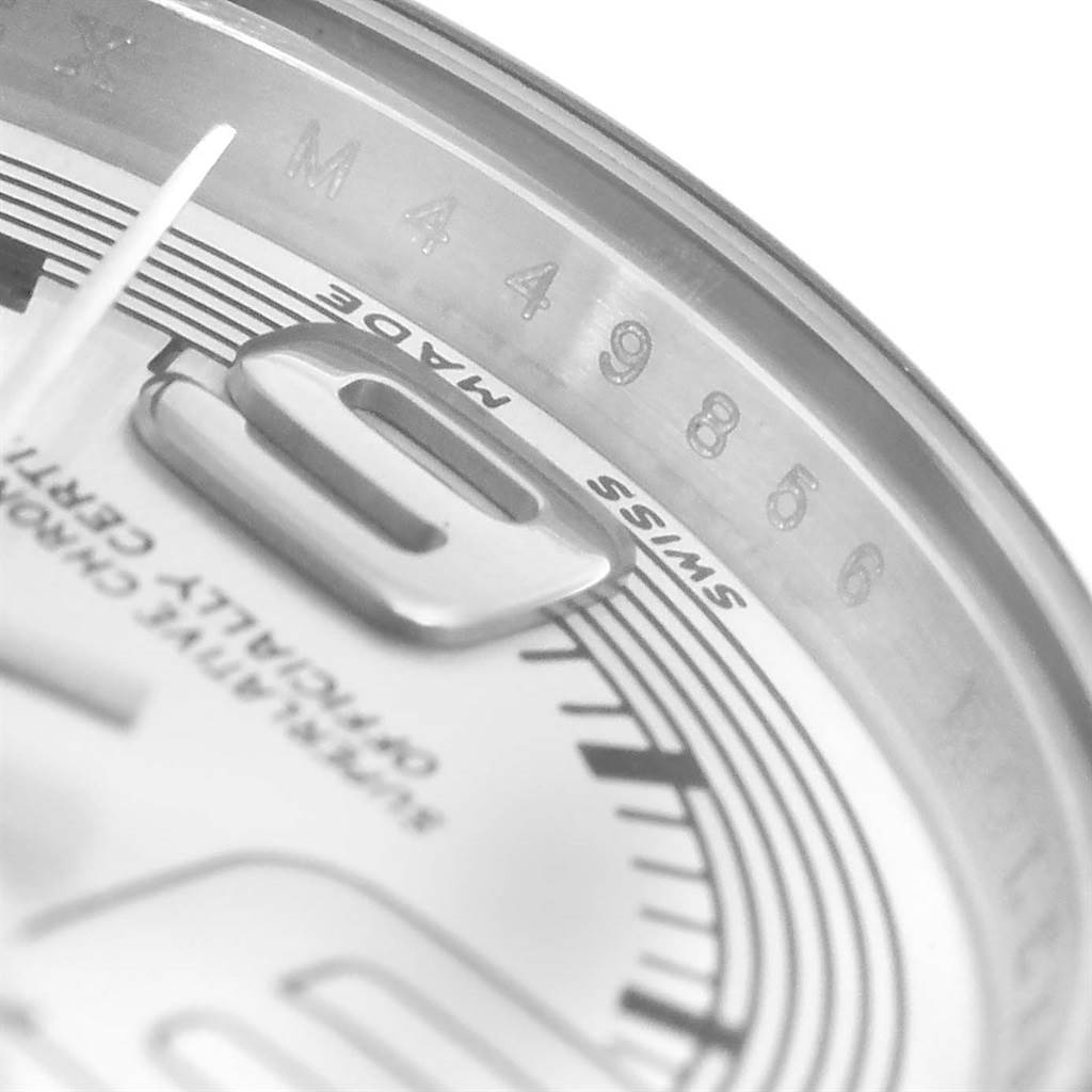 This close-up shows the dial and inner bezel of the Rolex Oyster Perpetual 176200 Women
s Stainless Steel Silver Dial 176200 Women
s Stainless Steel Silver Dial watch, highlighting the "Swiss Made" text and part of the numbering.