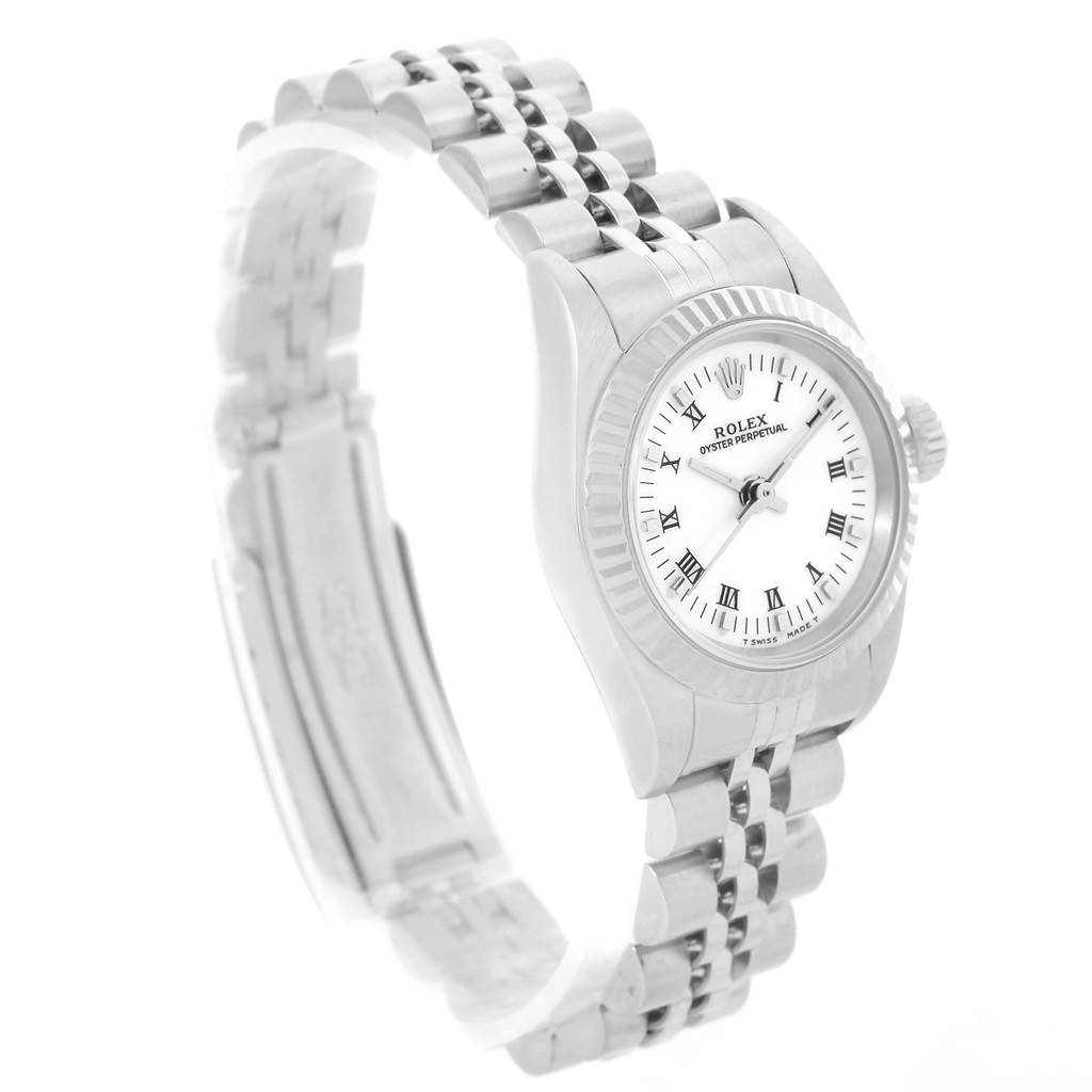 The image shows a front angled view of the Rolex Oyster Perpetual 67194 Women's Stainless Steel White Dial 67194 Women's Stainless Steel White Dial watch, highlighting the dial, bezel, and bracelet.