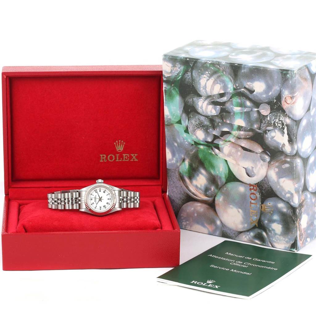 The image shows a Rolex Oyster Perpetual 67194 Women's Stainless Steel White Dial 67194 Women's Stainless Steel White Dial watch in its box, with the case, bracelet, manual, and outer box visible.