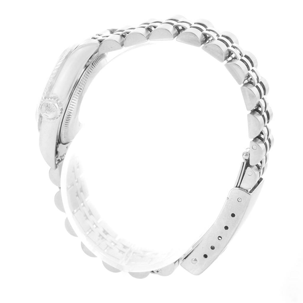 The image shows a side angle of the Rolex Oyster Perpetual 67194 Women's Stainless Steel White Dial 67194 Women's Stainless Steel White Dial watch with a focus on the band and clasp.