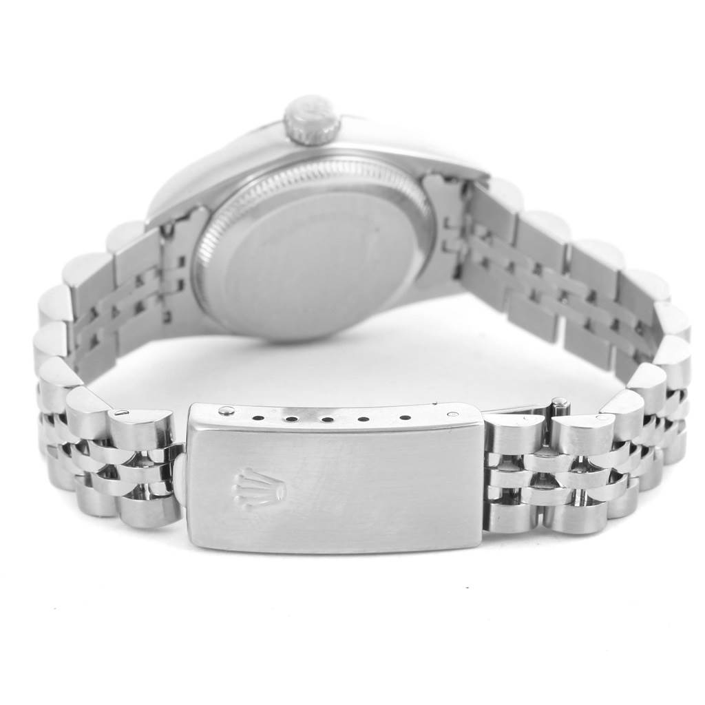 This image shows the back view of a Rolex Oyster Perpetual 67194 Women's Stainless Steel White Dial 67194 Women's Stainless Steel White Dial watch, focusing on the clasp, bracelet, and case back.