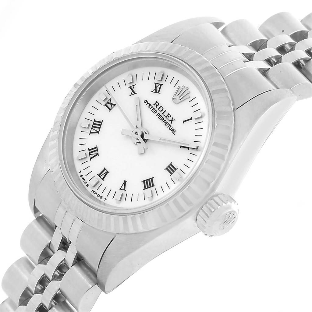 The Rolex Oyster Perpetual 67194 Women's Stainless Steel White Dial 67194 Women's Stainless Steel White Dial watch is angled to show the dial, bezel, crown, and part of the bracelet.