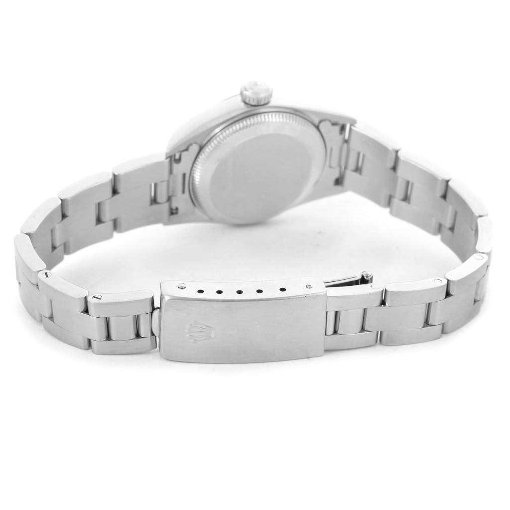 The image shows the back of the Rolex Oyster Perpetual 67180 Men
s Stainless Steel Blue Dial 67180 Men
s Stainless Steel Blue Dial watch, focusing on the bracelet and clasp.