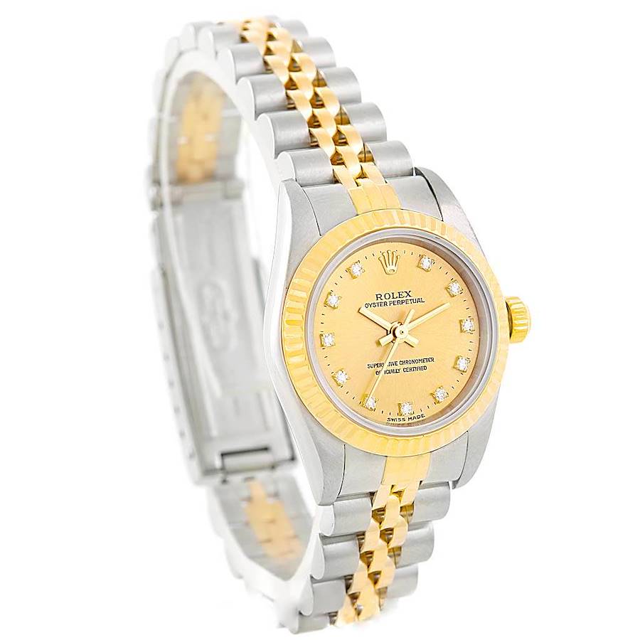 The Rolex Oyster Perpetual watch is shown at a front-right angle, highlighting its gold face, bezel, and two-tone bracelet.