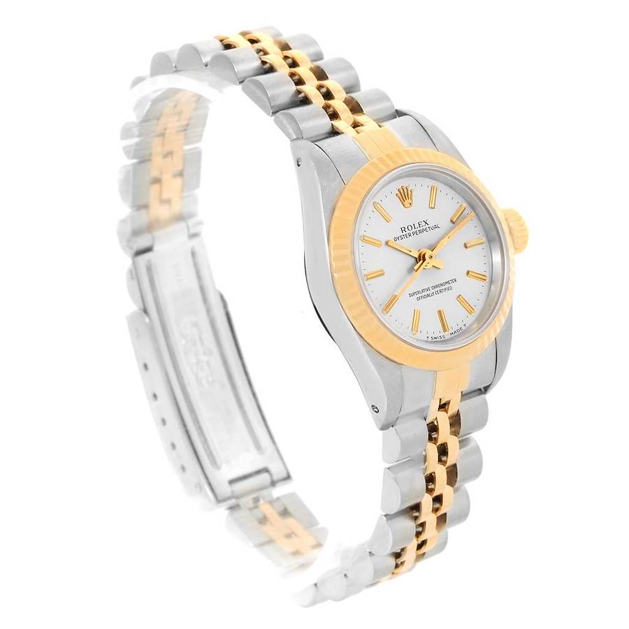 The image shows a Rolex Oyster Perpetual watch at a three-quarter angle, highlighting its two-tone bracelet and face.