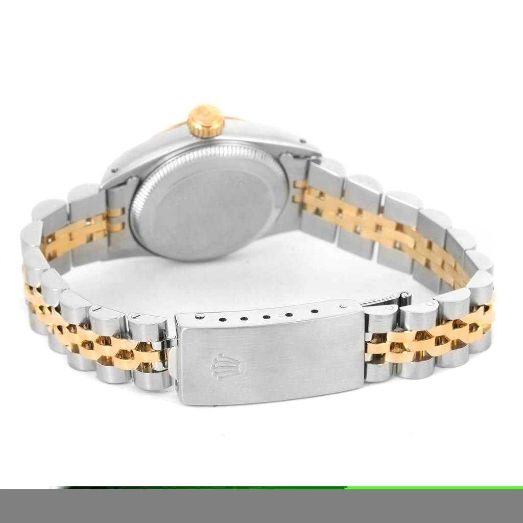 This image shows the back case and bracelet, including the clasp, of a Rolex Oyster Perpetual 67193 Women's Steel and Gold (two tone) Silver Dial 67193 Women's Steel and Gold (two tone) Silver Dial watch.