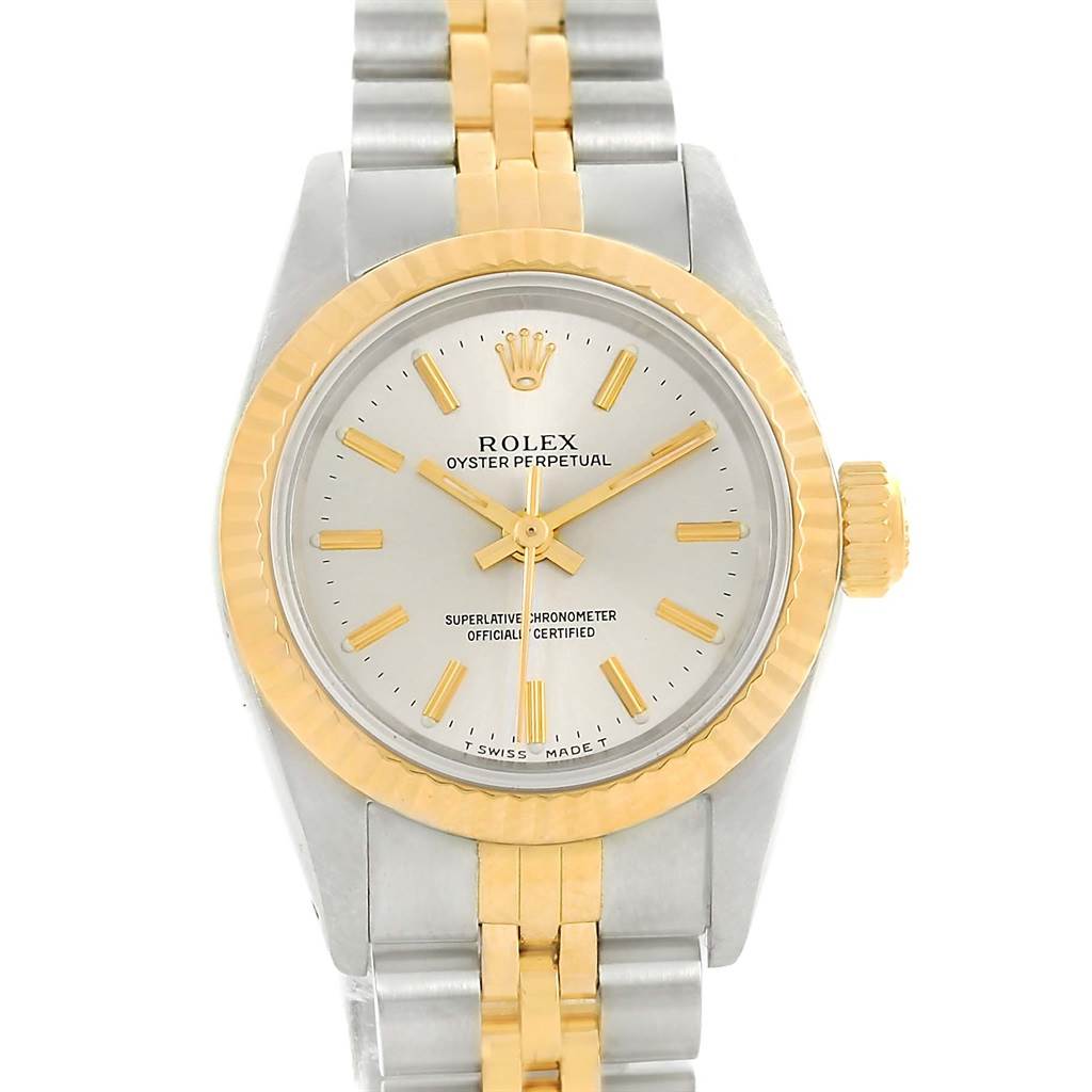 This image shows a frontal view of a Rolex Oyster Perpetual 67193 Women's Steel and Gold (two tone) Silver Dial 67193 Women's Steel and Gold (two tone) Silver Dial watch, highlighting its dial, bezel, and two-tone bracelet.