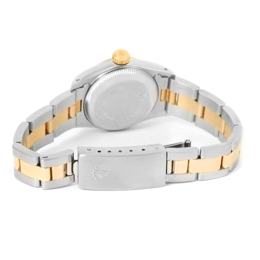 This image shows the backside, clasp, and bracelet of the Rolex Oyster Perpetual 67193 Women's Steel and Gold (two tone) White Dial 67193 Women's Steel and Gold (two tone) White Dial watch in a two-tone metal finish.