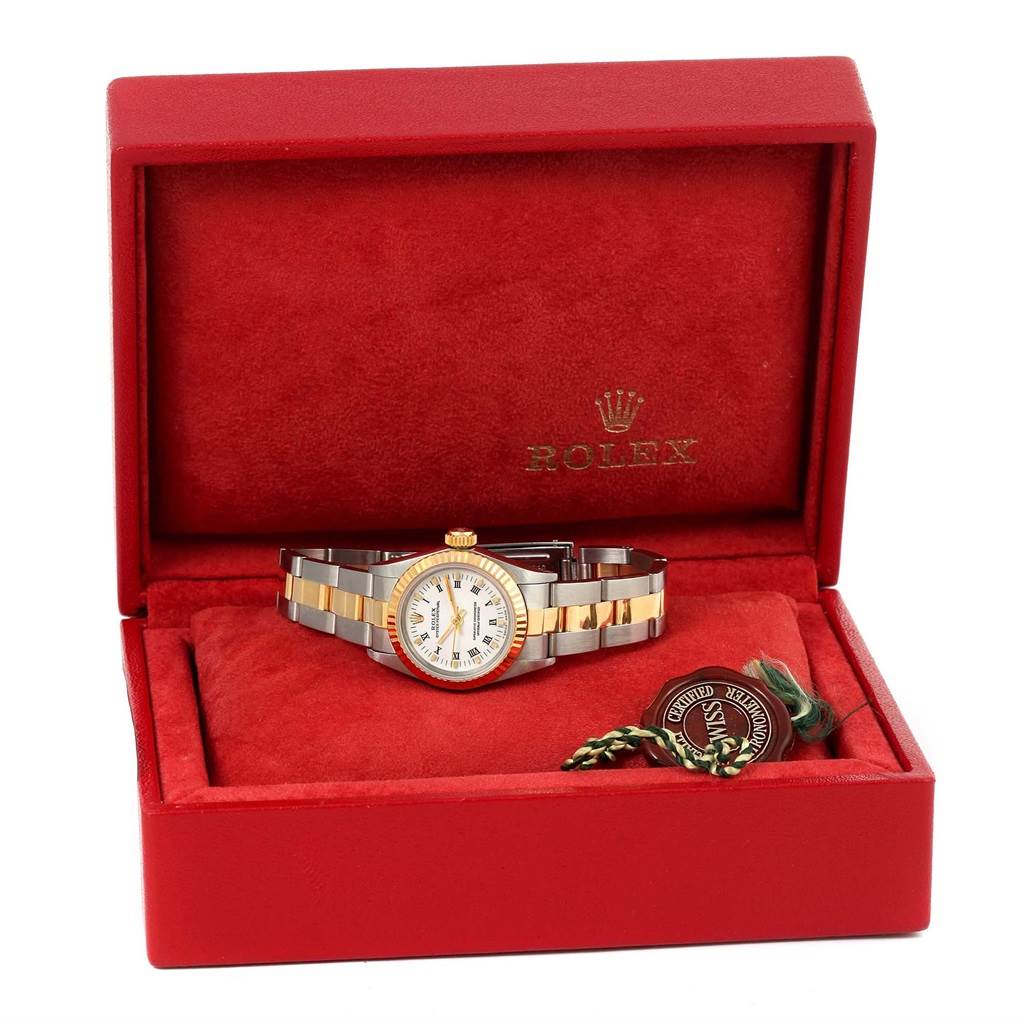 The image shows a Rolex Oyster Perpetual 67193 Women's Steel and Gold (two tone) White Dial 67193 Women's Steel and Gold (two tone) White Dial watch displayed in an open red case, highlighting the watch and its bracelet.