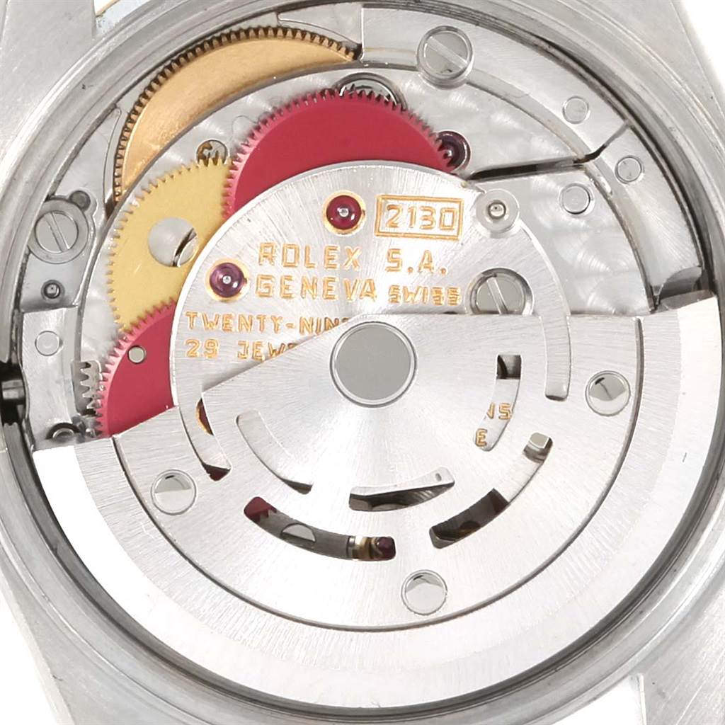 This image shows the movement of a Rolex Oyster Perpetual 67193 Women's Steel and Gold (two tone) White Dial 67193 Women's Steel and Gold (two tone) White Dial watch, specifically the caliber 2130.